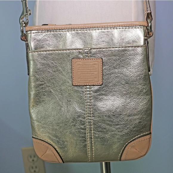 Coach Handbags - COACH Gold Metallic Crossbody Swingpack Purse
